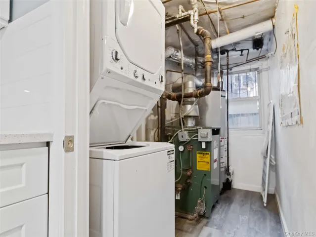 a view of a storage & utility room with washer and dryer