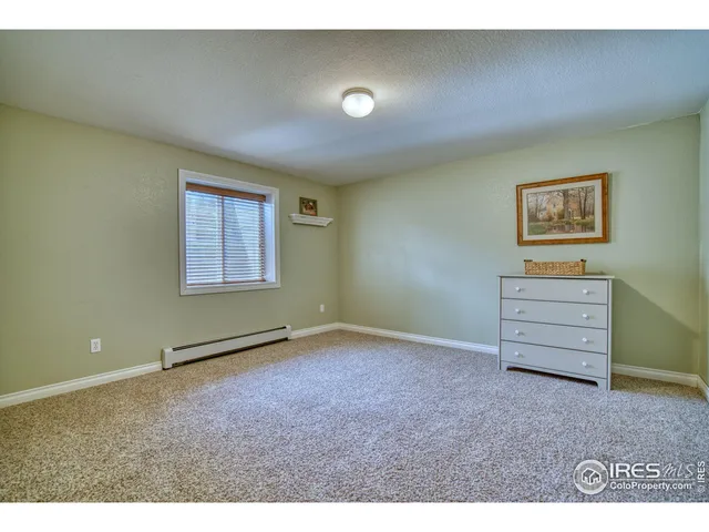 a view of room with stairs and a window
