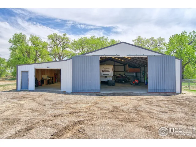 a view of a garage with storage