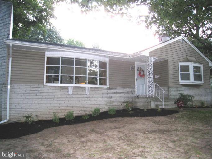 315 Hampton Road Linthicum Heights, MD 21090 - Photo 1 of 22 a front view of a house with a yard