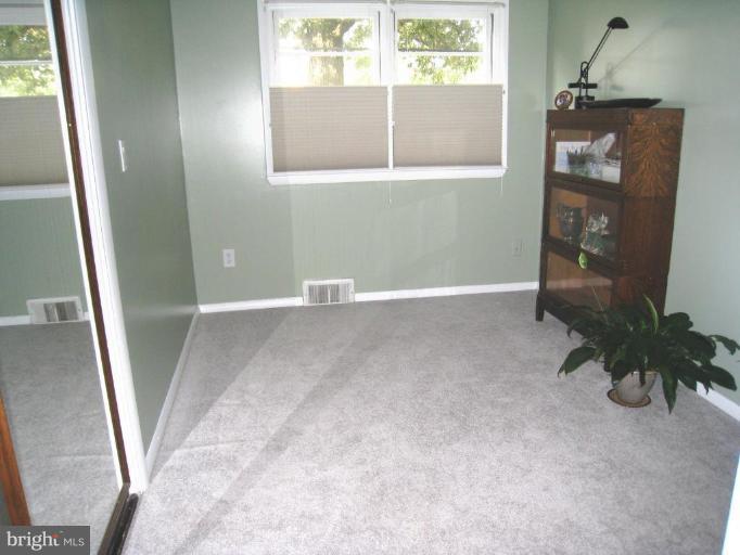 315 Hampton Road Linthicum Heights, MD 21090 - Photo 11 of 22 a view of an empty room with a window