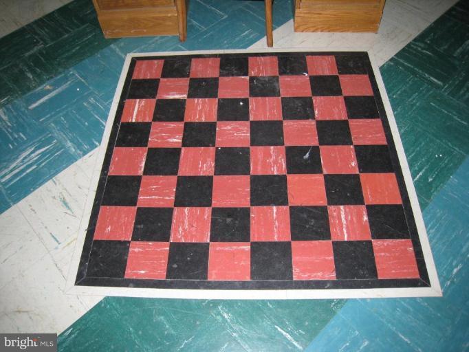 315 Hampton Road Linthicum Heights, MD 21090 - Photo 17 of 22 a picture of a black and white checkered floor