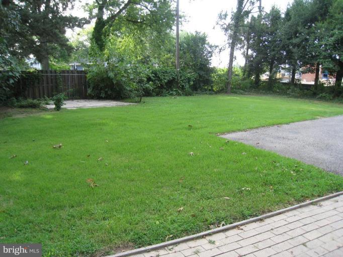 315 Hampton Road Linthicum Heights, MD 21090 - Photo 20 of 22 a view of a park with large trees