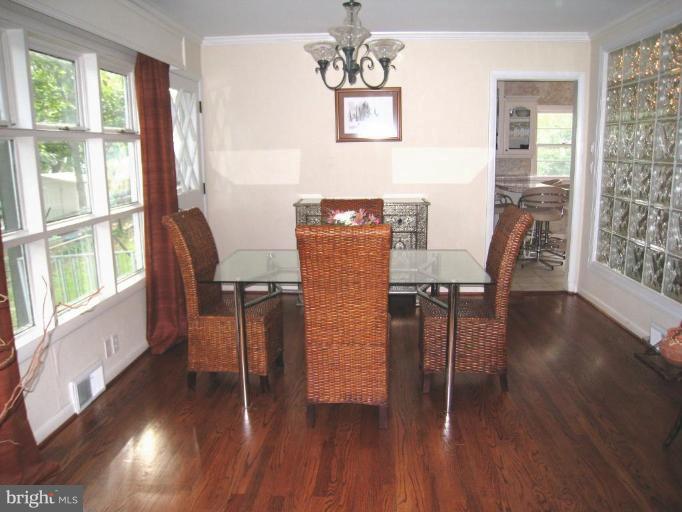 315 Hampton Road Linthicum Heights, MD 21090 - Photo 4 of 22 a view of a dining room with furniture and wooden floor