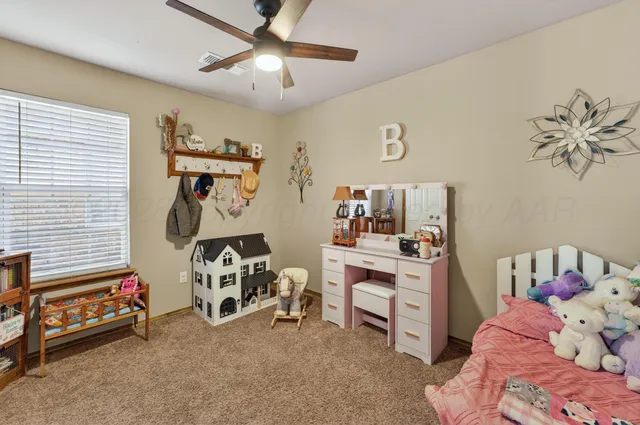 a bedroom with furniture and a bed