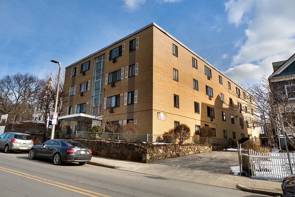 46 Adams Street, Unit C1 Boston, MA 02122 - Photo 13 of 13 a view of a building and a street