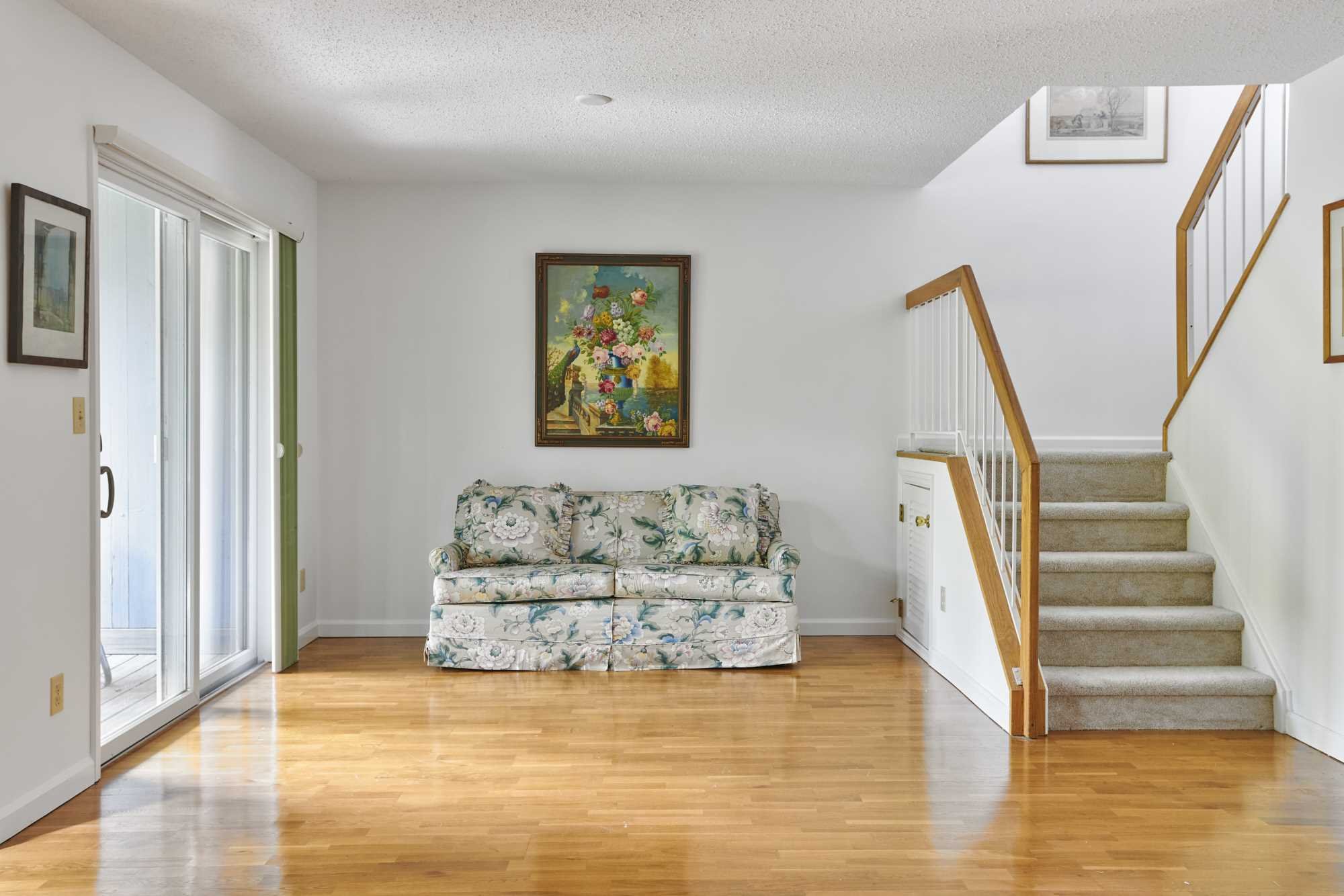 37 North Loop Rhinebeck, NY 12572 - Photo 11 of 13 a living room with furniture and a large window