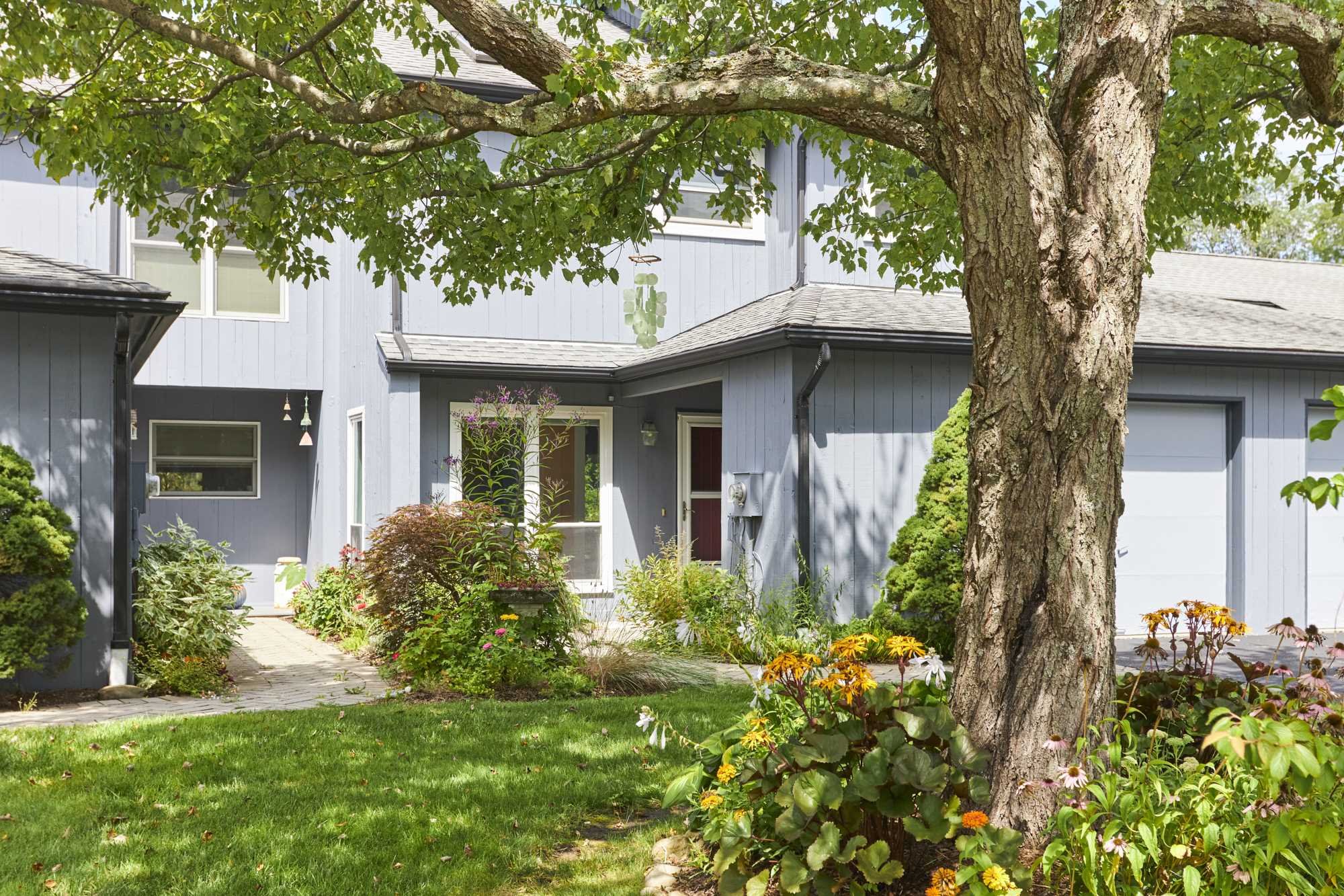 37 North Loop Rhinebeck, NY 12572 - Photo 2 of 13 a front view of a house with garden