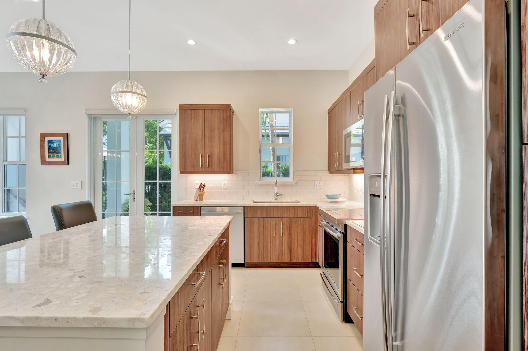 1000 Phillips Road Delray Beach, FL 33483 - Photo 16 of 74 SUNNY KITCHEN WITH COURTYARD VIEWS