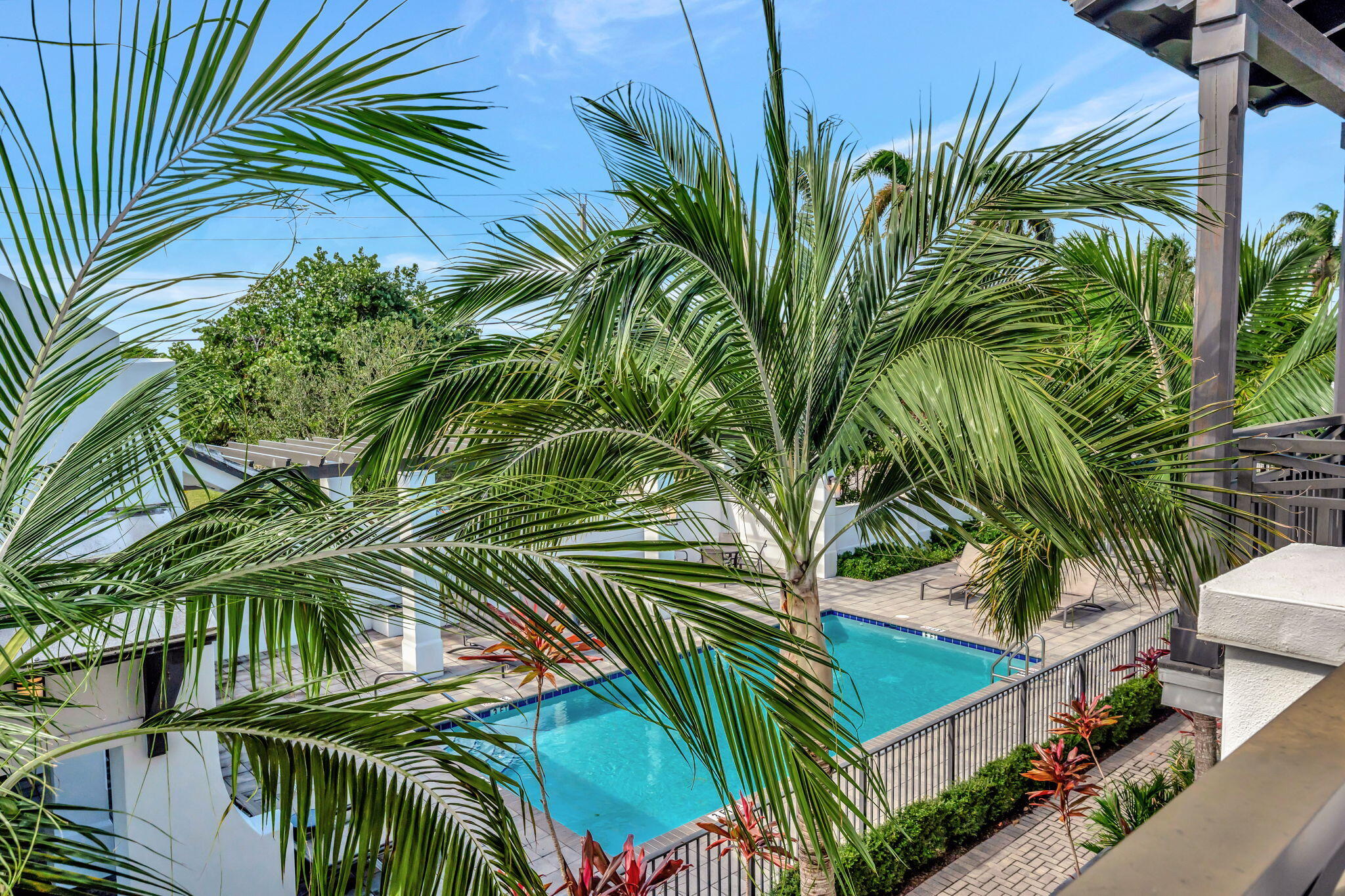 1000 Phillips Road Delray Beach, FL 33483 - Photo 41 of 74 COURTYARD AND POOL VIEW FROM BALCONY