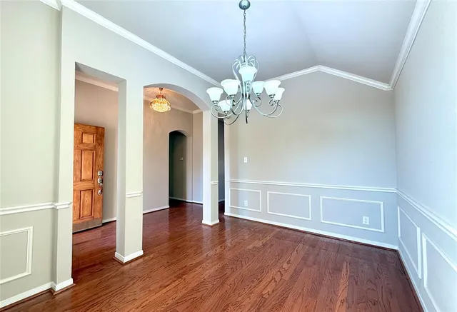 a view of a livingroom with wooden floor
