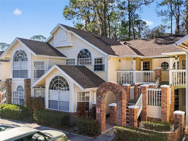 a front view of a house with yard