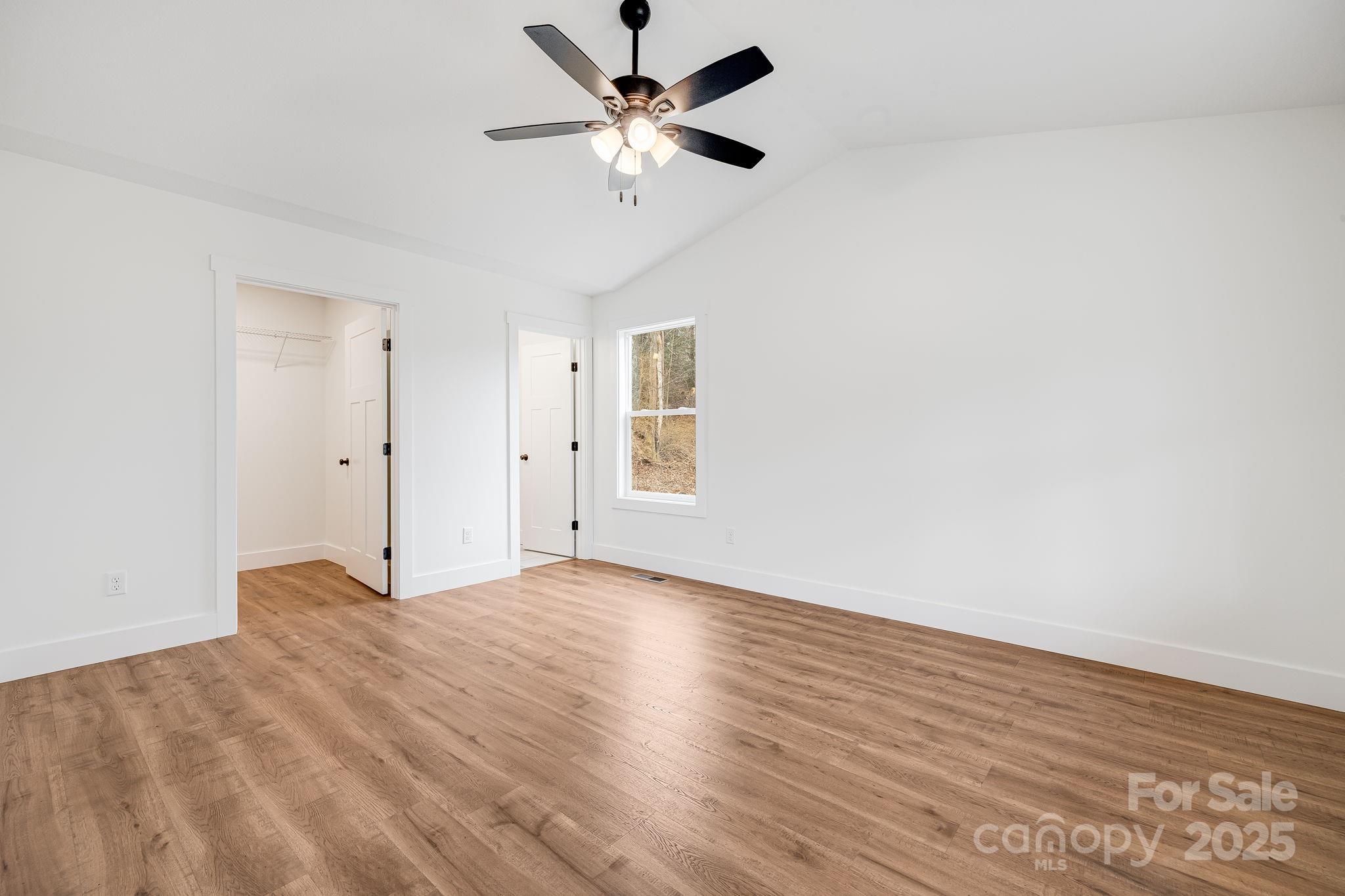 382 Holtzclaw Street Canton, NC 28716 - Photo 20 of 34 a view of an empty room with a window