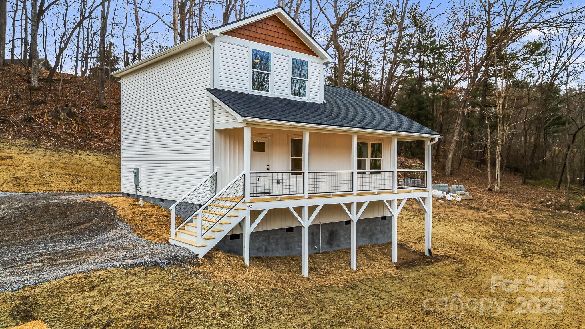 382 Holtzclaw Street Canton, NC 28716 - Photo 2 of 34 a front view of a house with a yard