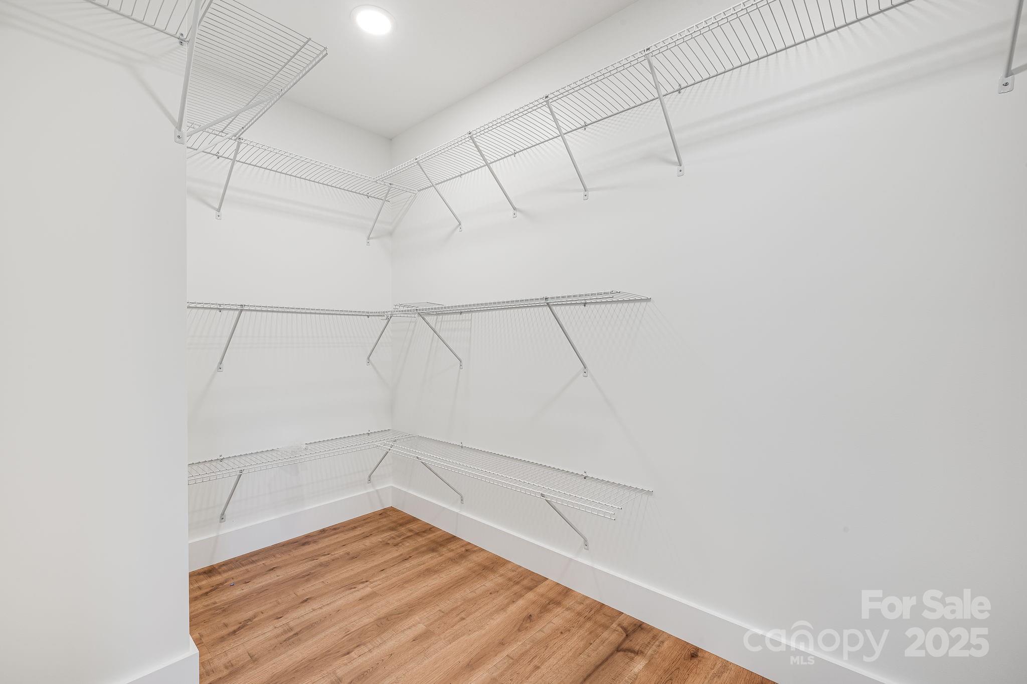 382 Holtzclaw Street Canton, NC 28716 - Photo 23 of 34 a view of a room with racks on the wall