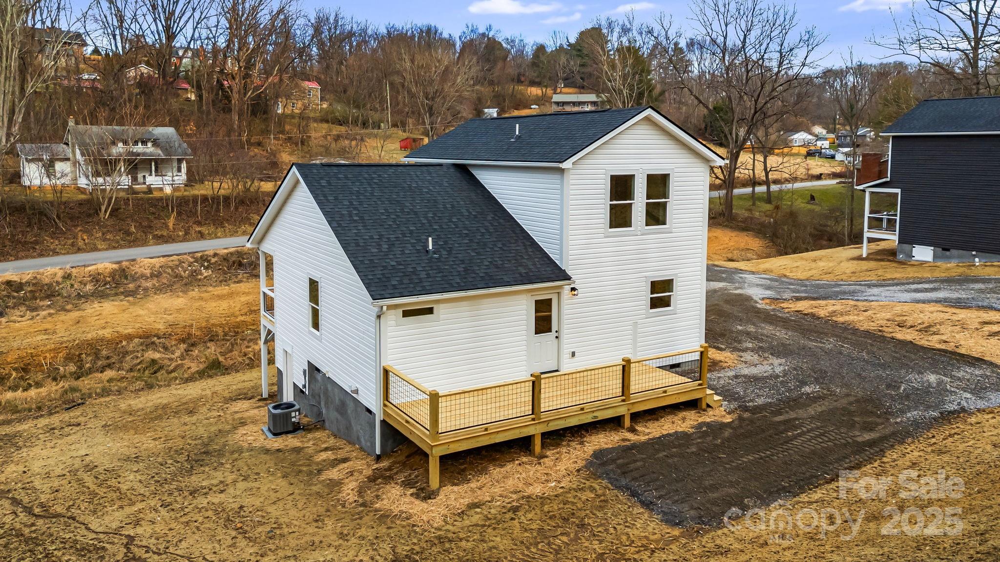 382 Holtzclaw Street Canton, NC 28716 - Photo 5 of 34 a view of a house with a yard