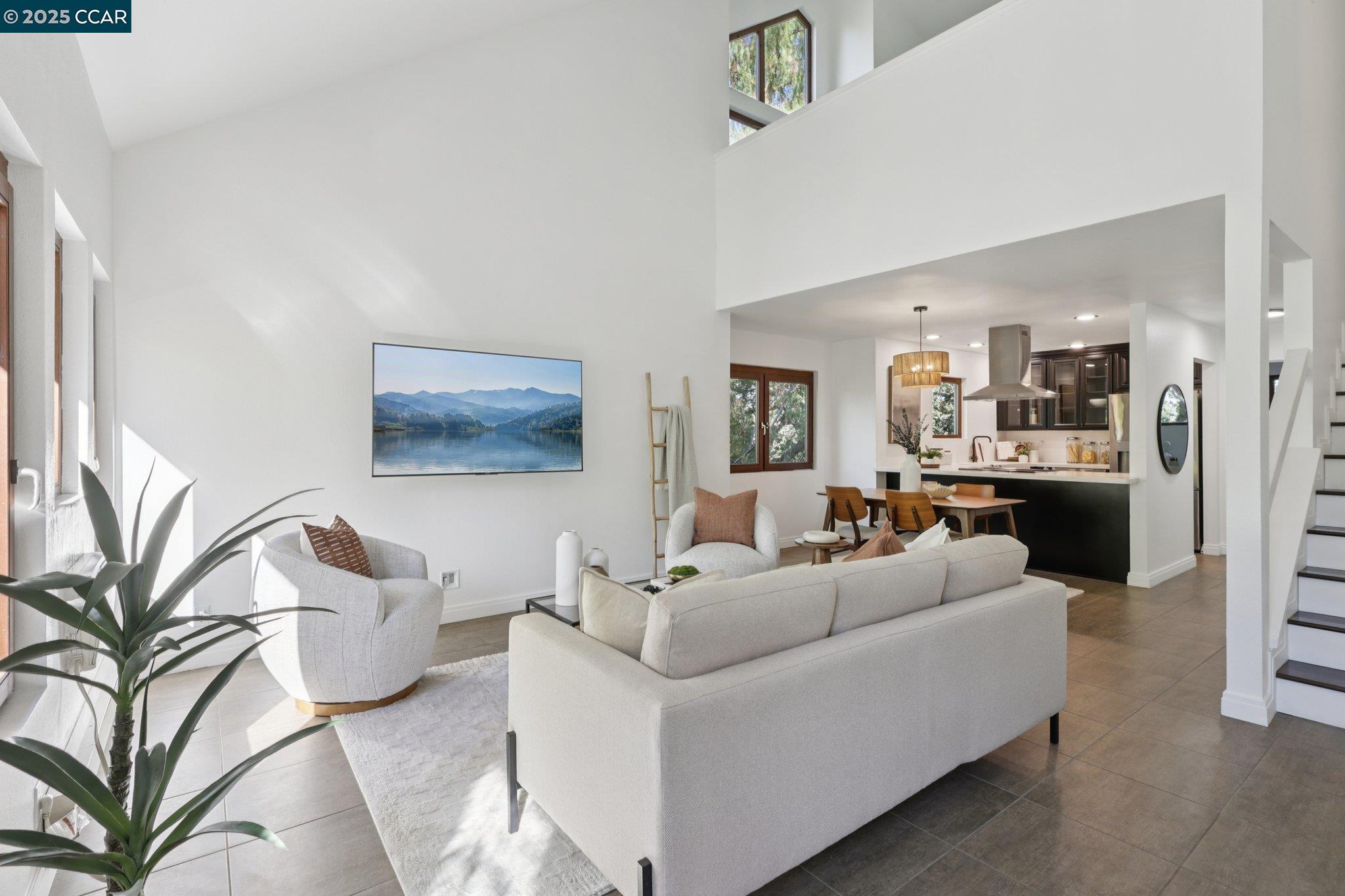 600 Suntree Lane, Unit 608 Pleasant Hill, CA 94523 - Photo 1 of 47 a living room with furniture and a view of kitchen