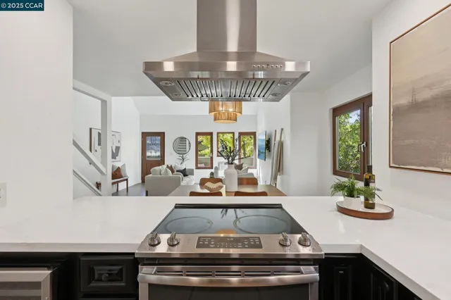 a kitchen with a sink and a large window
