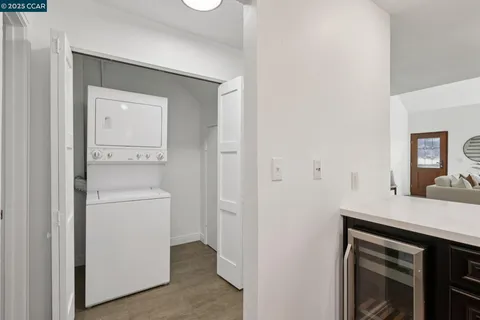 a view of living room with washer and dryer