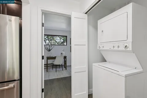 a view of a livingroom with furniture and front door