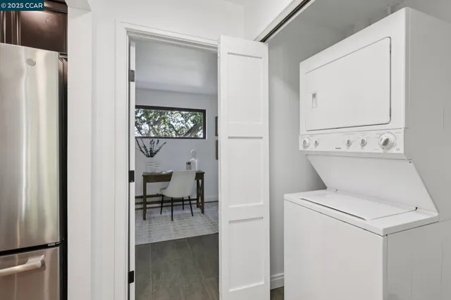a view of a livingroom with furniture and front door