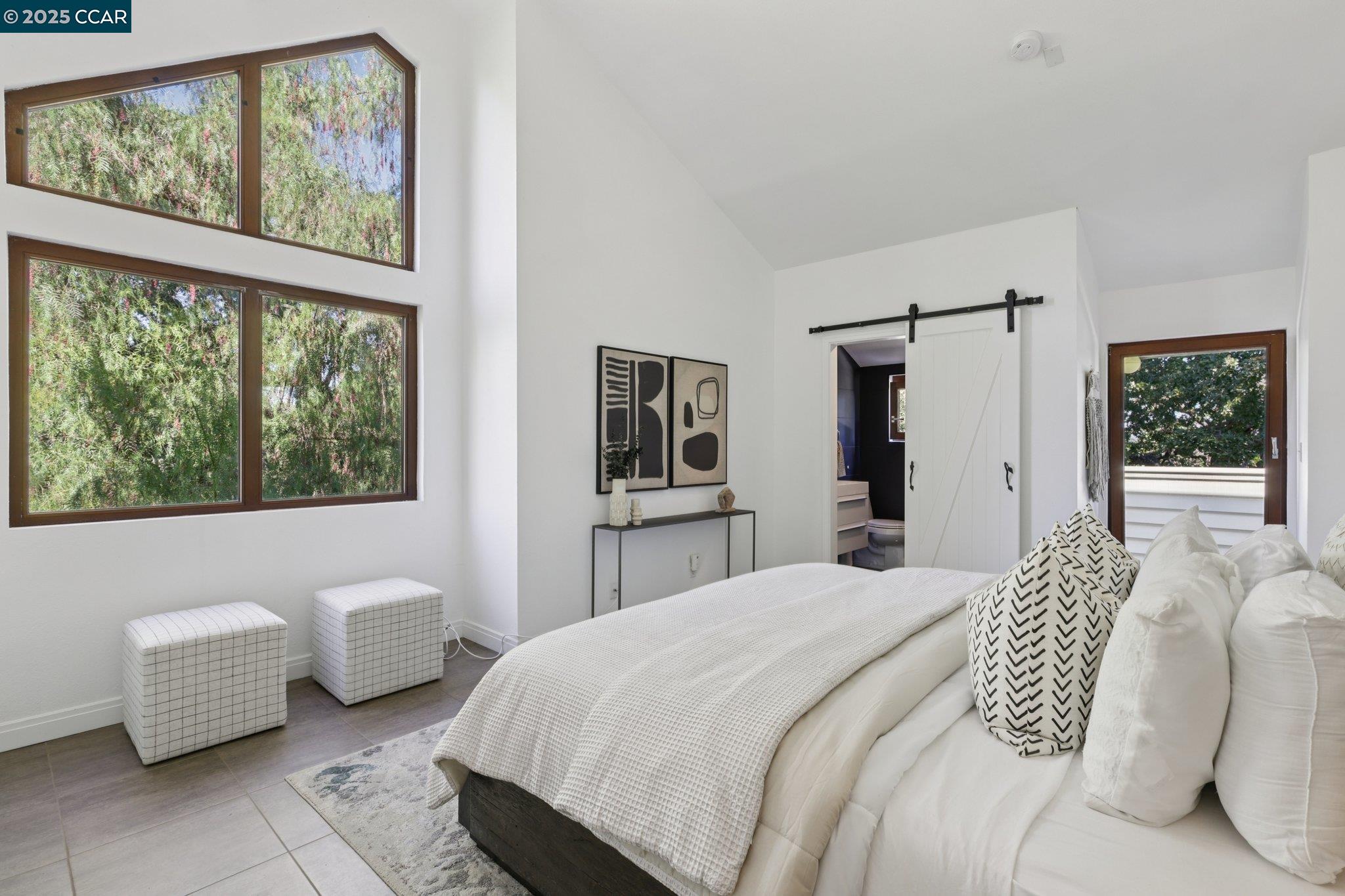 600 Suntree Lane, Unit 608 Pleasant Hill, CA 94523 - Photo 27 of 47 a bedroom with a bed and a large window