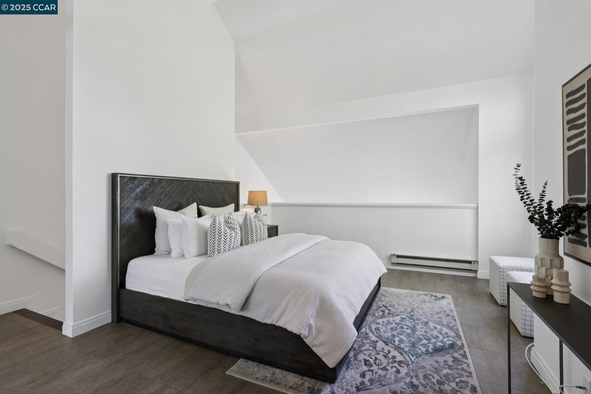 600 Suntree Lane, Unit 608 Pleasant Hill, CA 94523 - Photo 29 of 47 a bedroom with a bed and a potted plant