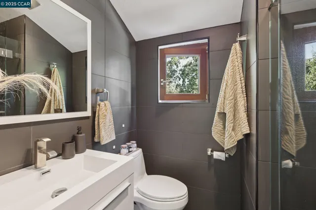 a view of balcony with wooden floor and bench