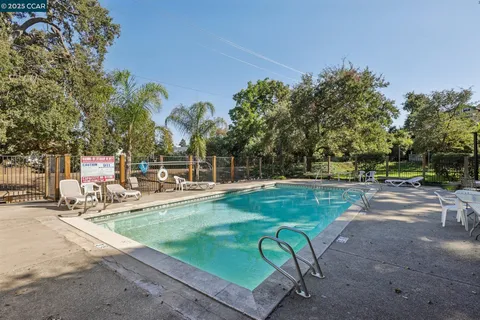 a view of a bench in a backyard