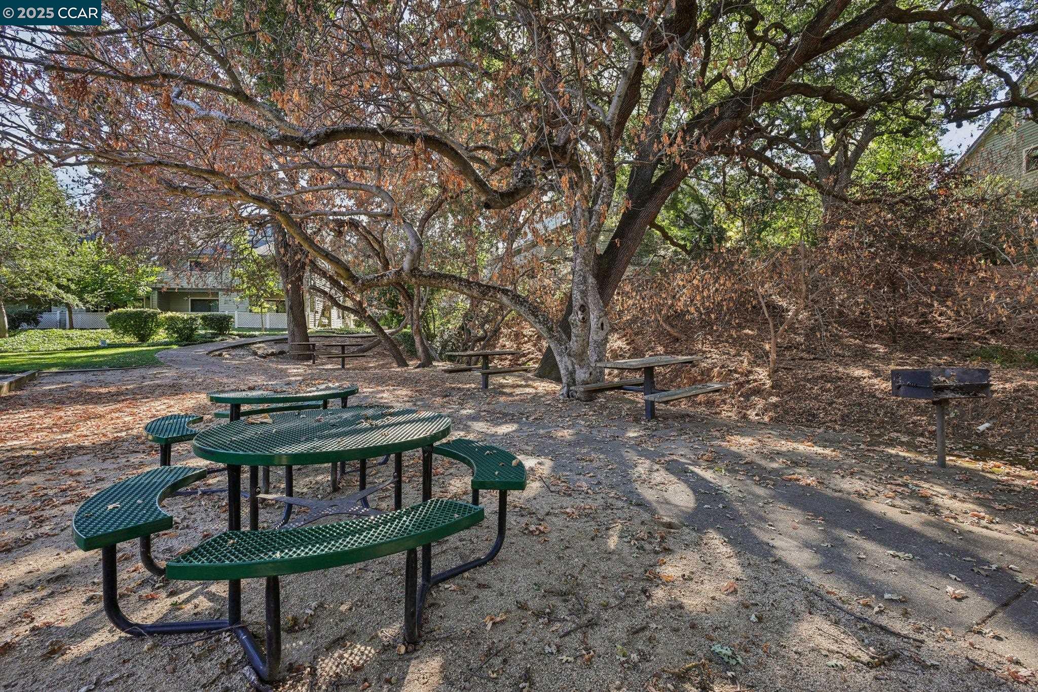 600 Suntree Lane, Unit 608 Pleasant Hill, CA 94523 - Photo 44 of 47 a view of a bench in a backyard