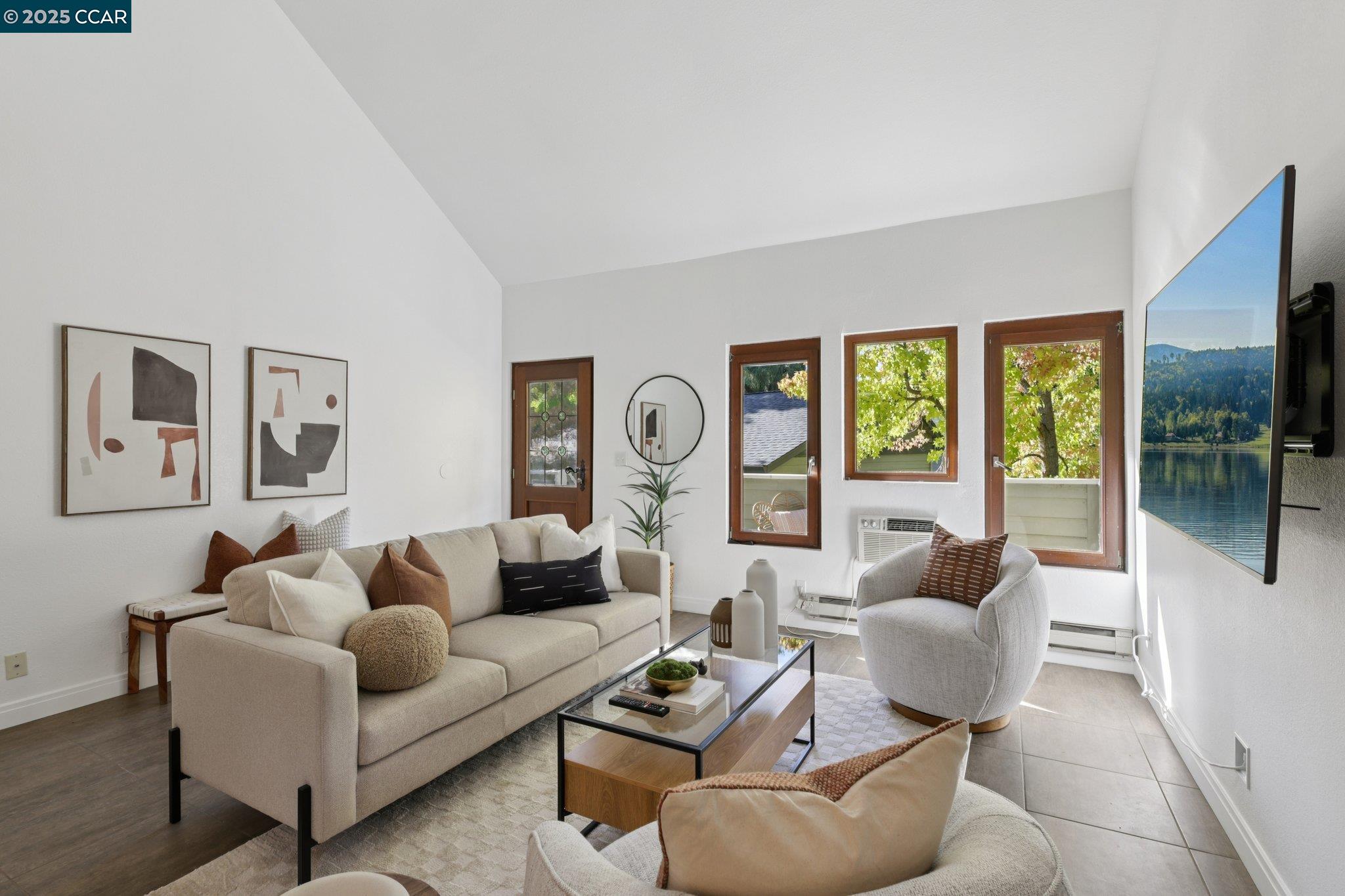 600 Suntree Lane, Unit 608 Pleasant Hill, CA 94523 - Photo 6 of 47 a living room with furniture and a large window