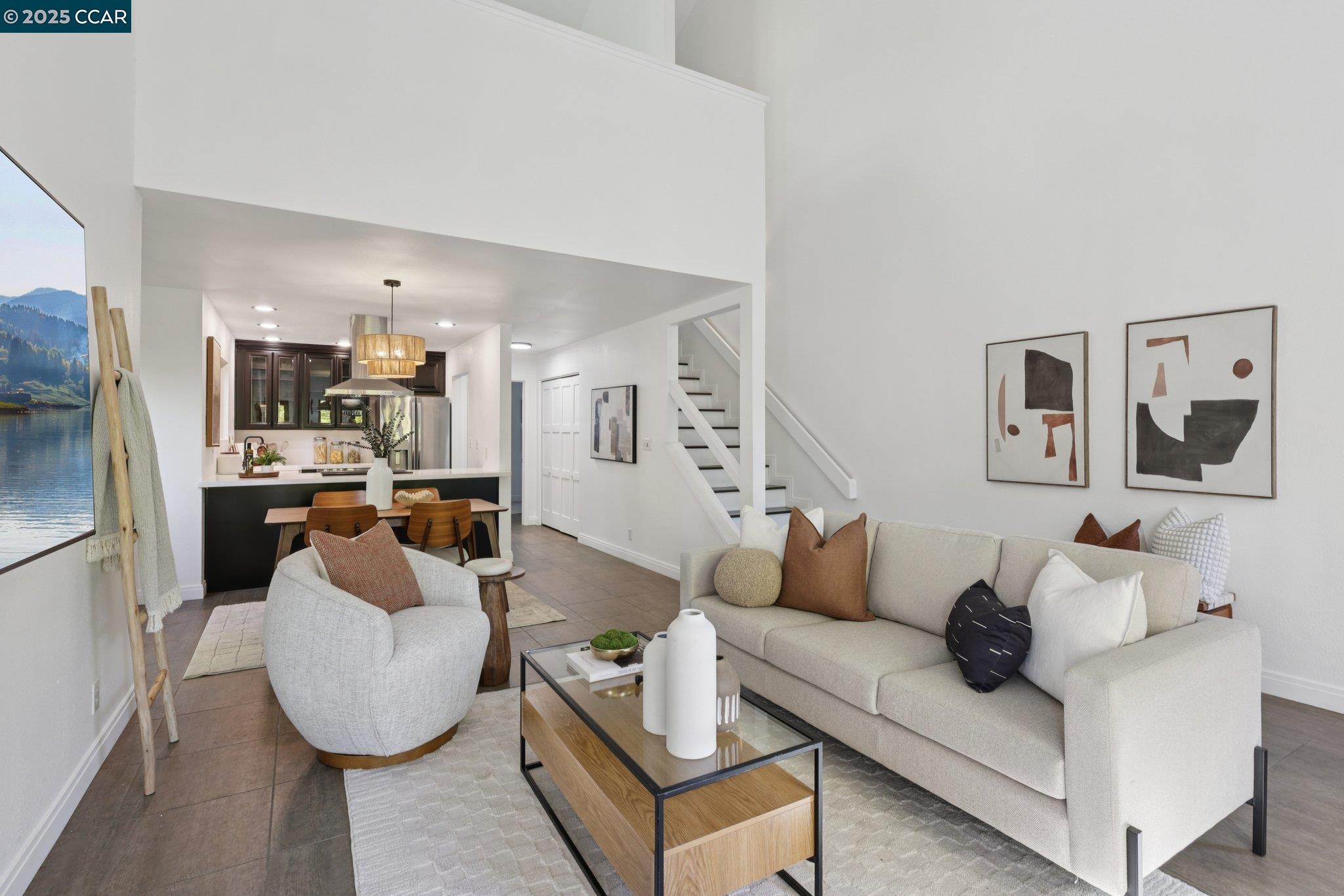 600 Suntree Lane, Unit 608 Pleasant Hill, CA 94523 - Photo 7 of 47 a living room with furniture and a flat screen tv