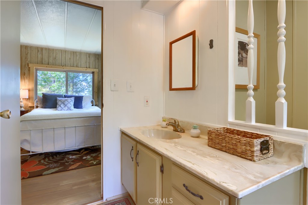 2843 East Westfall Road Mariposa, CA 95338 - Photo 23 of 47 a bathroom with a sink and a mirror