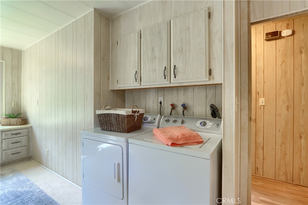 2843 East Westfall Road Mariposa, CA 95338 - Photo 31 of 47 a kitchen with a refrigerator and cabinets