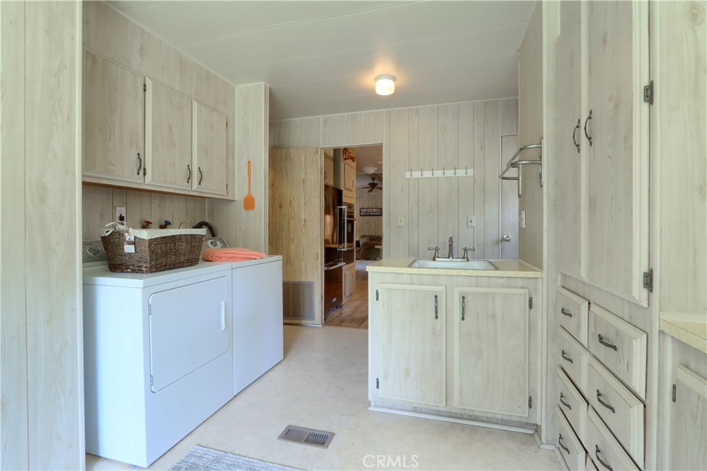 2843 East Westfall Road Mariposa, CA 95338 - Photo 32 of 47 a kitchen with cabinets appliances and a window