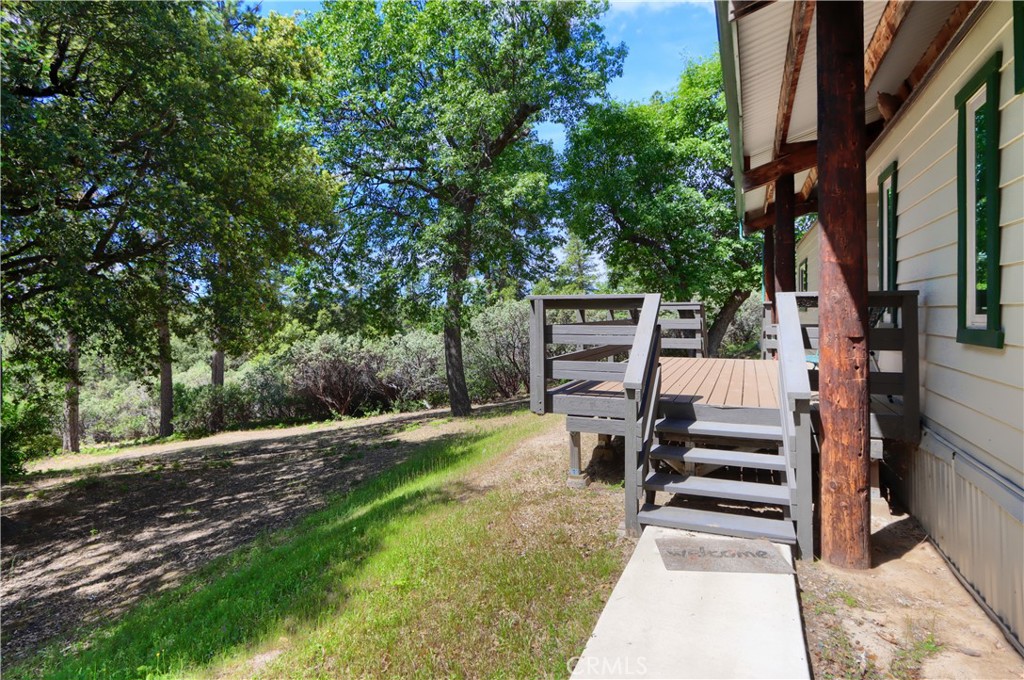 2843 East Westfall Road Mariposa, CA 95338 - Photo 35 of 47 a view of a backyard with chairs
