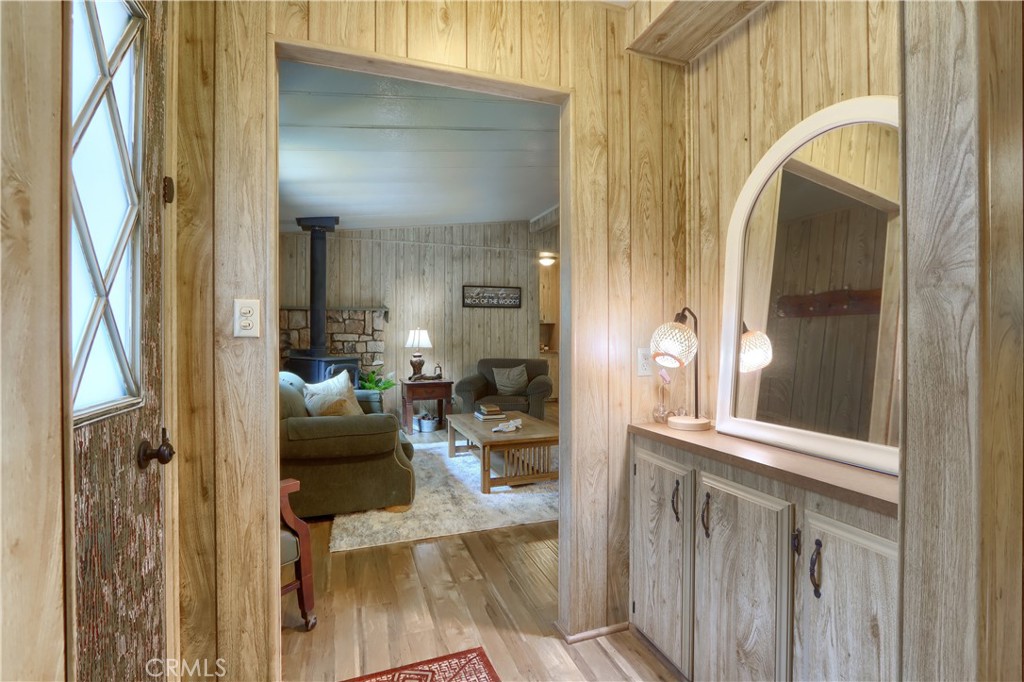 2843 East Westfall Road Mariposa, CA 95338 - Photo 6 of 47 a view of a hallway with living room and furniture