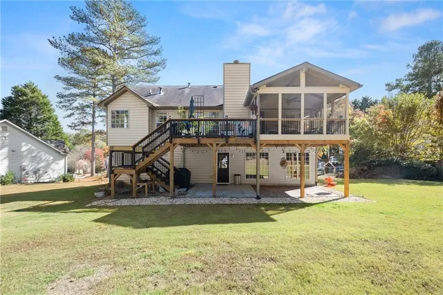 a view of a backyard of the house