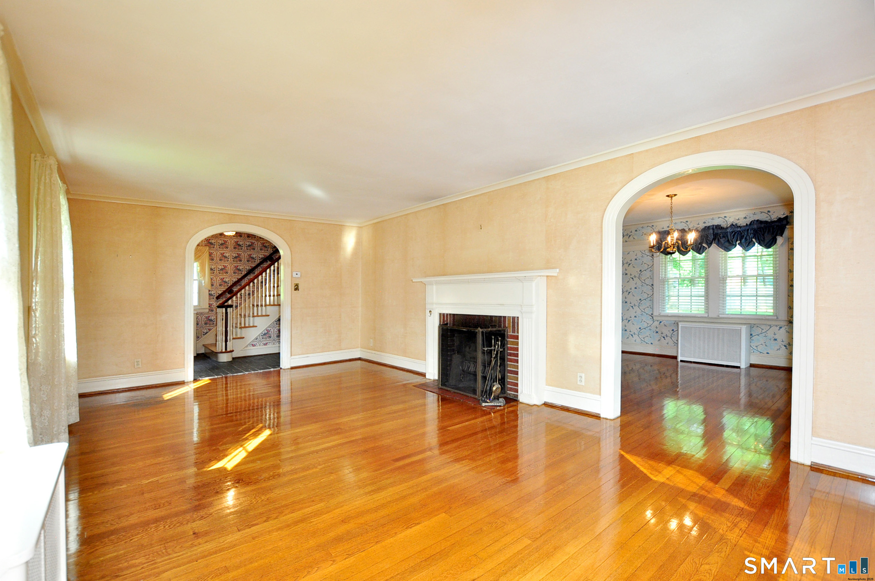 10 Harvey Road Windsor, CT 06095 - Photo 5 of 36 a view of empty room with wooden floor