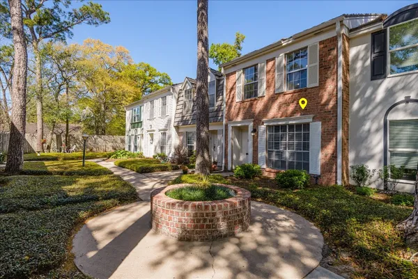 a view of an empty room with glass door
