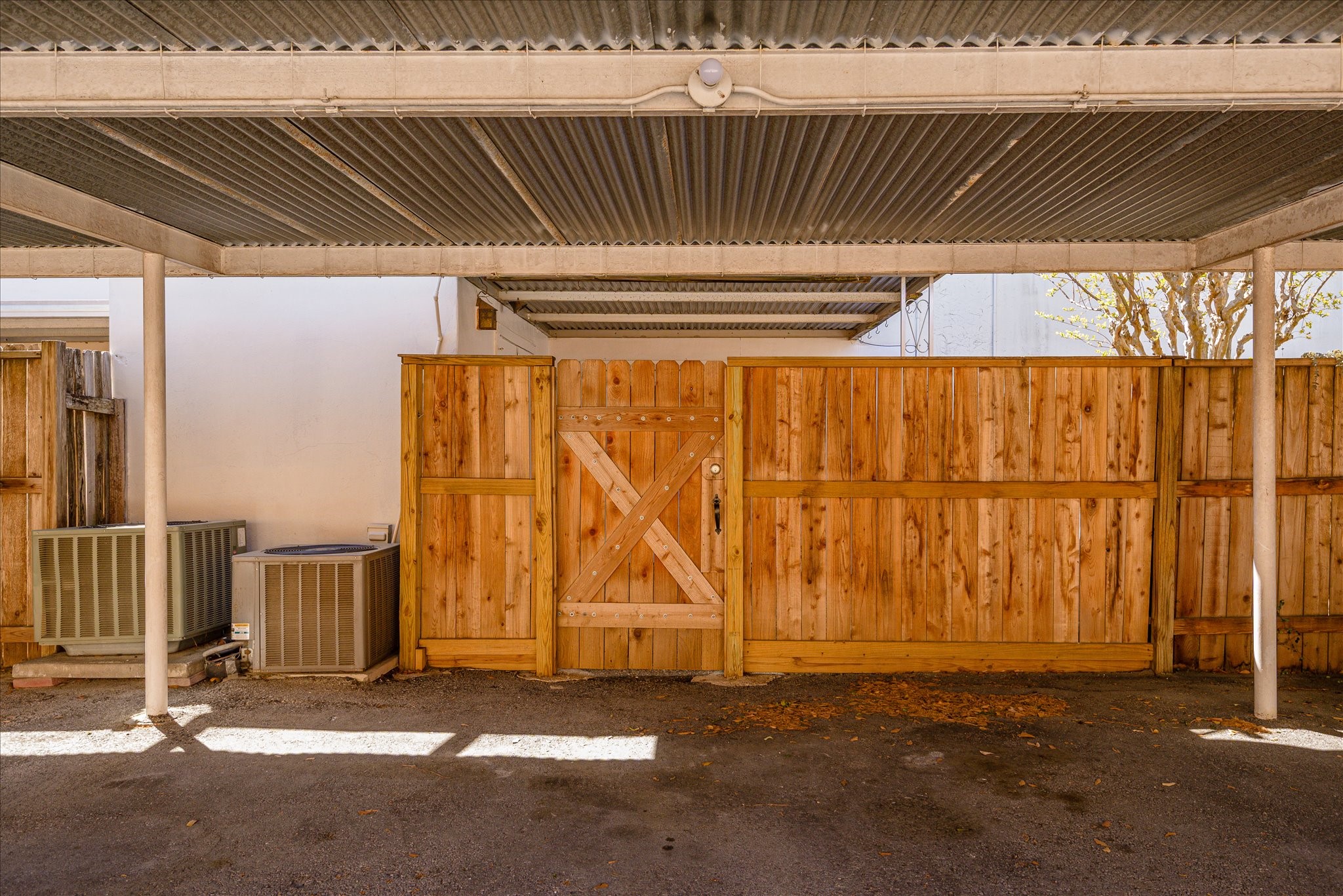 1425 Springrock Lane Houston, TX 77055 - Photo 22 of 30 an empty room with a fireplace and door