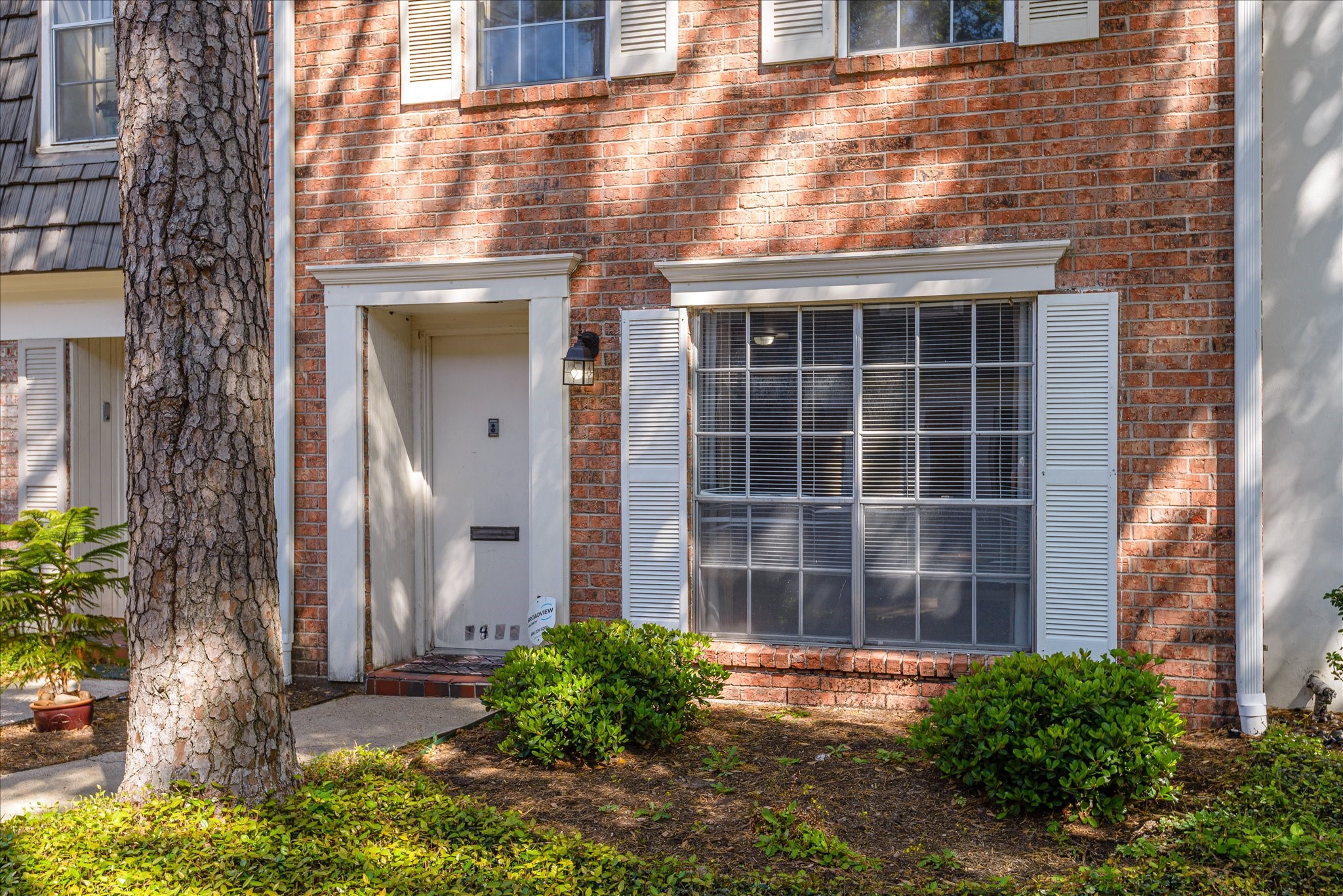1425 Springrock Lane Houston, TX 77055 - Photo 3 of 30 a front view of a house with a yard