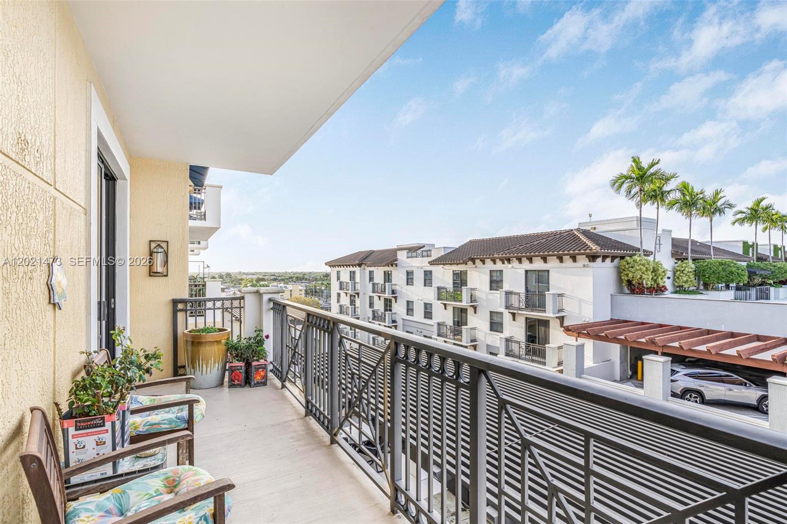 8395 Southwest 73rd Avenue, Unit 710 Miami, FL 33143 - Photo 25 of 32 a view of balcony with furniture