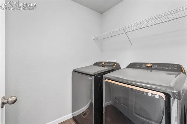 a utility room with dryer and washer