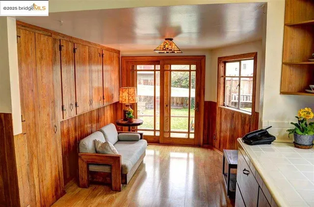a living room with furniture and a window