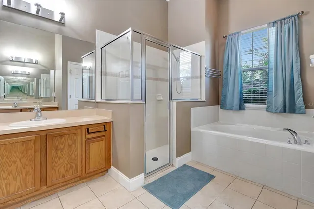 a bathroom with a bathtub and a sink