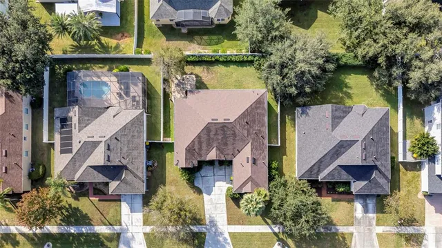 an aerial view of houses and roads