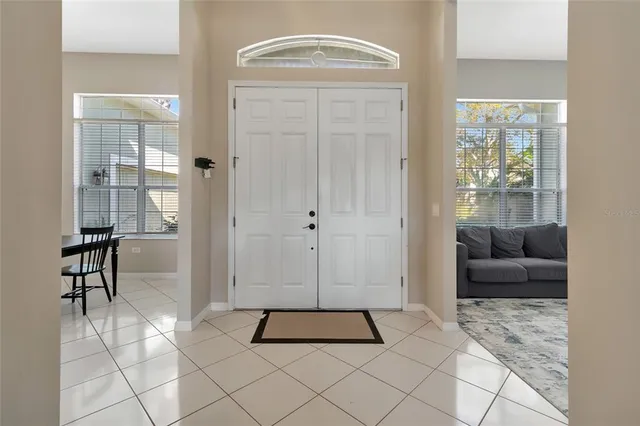 a view of livingroom with furniture and windows