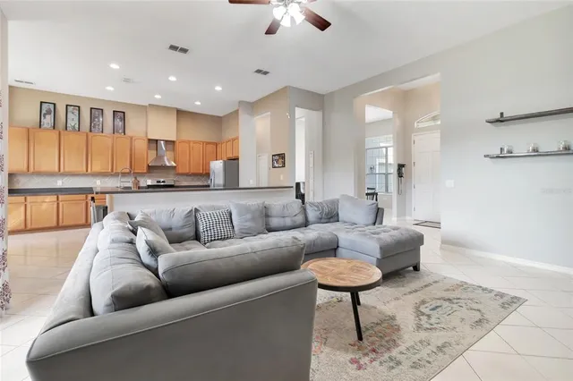 a living room with furniture and a rug