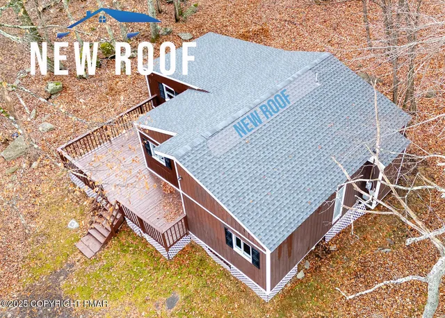 a view of a house with a roof deck